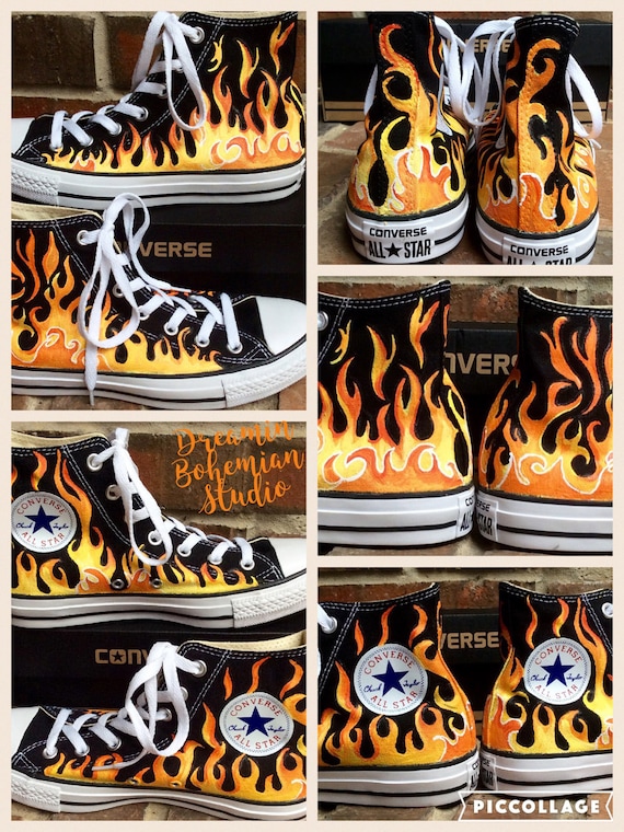 converse nere con fiamme