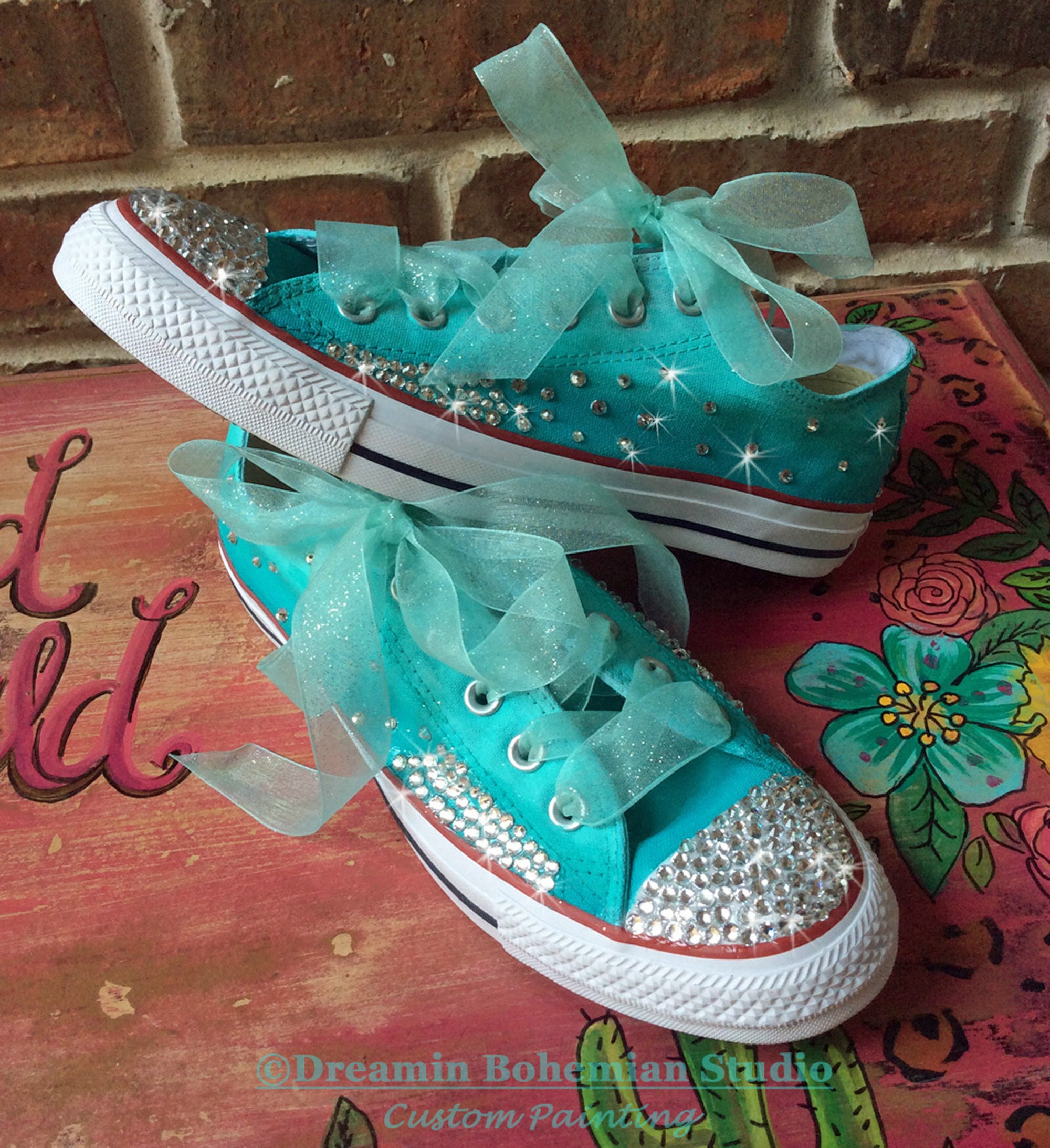 converse turquoise low tops