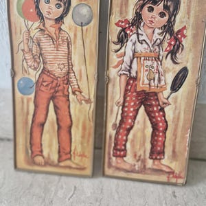 coppia di quadri vintage Idylle Falconi, anni &#39;60/&#39;70 serie Big Eyes