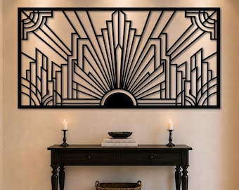 May include: A large rectangular black metal wall art piece featuring a symmetrical geometric pattern with radiating lines and angular shapes. The design includes a central semi-circle at the bottom with vertical and diagonal lines extending outward.