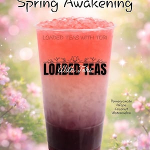 May include: A layered beverage in a clear plastic cup, featuring a gradient of colors from dark purple to light pink, topped with crushed ice. The text "Spring Awakening" and "Loaded Teas With Tori" are visible. Flavors include pomegranate, grape, coconut, and watermelon.