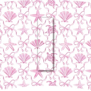May include: A repeating pattern of pink starfish, seashells, turtles, and bows on a white background. The watercolor design is delicate and feminine, suitable for coastal or nautical-themed products.