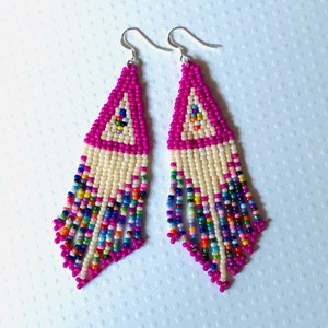 Beautiful Long pink and cream colored earrings with   multicolored fringe and sterling silver ear wires and findings.