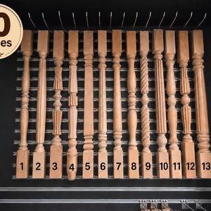 May include: A set of 10 light brown wooden stair balusters arranged in a row, each featuring a unique turned or fluted design. The balusters are numbered 1 through 13, with some numbers missing, and a circular badge in the corner reads 10 Pieces.