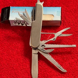 Vintage Sunware multi tool stainless steel 11 function knife 1999 original box Model FF019