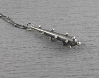 Polka dot drop necklace in sterling silver - oxidized finish - modern mechanical organic inspired design