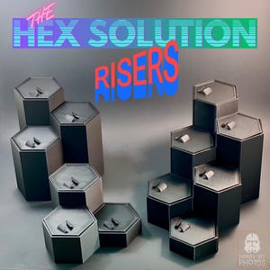May include: Black and gray hexagonal display risers. The risers are arranged in a tiered configuration, with small objects displayed on top. The text "THE HEX SOLUTION RISERS" is displayed in the background.