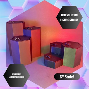 May include: Set of hexagonal display stands for figures, made of brown and green plastic. The stands are designed to be used with 6-inch scale figures. The stands are labeled "HEX SOLUTION FIGURE STANDS" and "6" Scale!" Designed by @LANDSPEEDERLUKE.