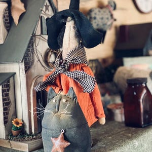 Primitive Muslin Witch with Cat on Rusty Wire Leash