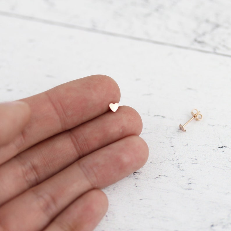 Teeny Heart Stud Earrings in Clear main image 1