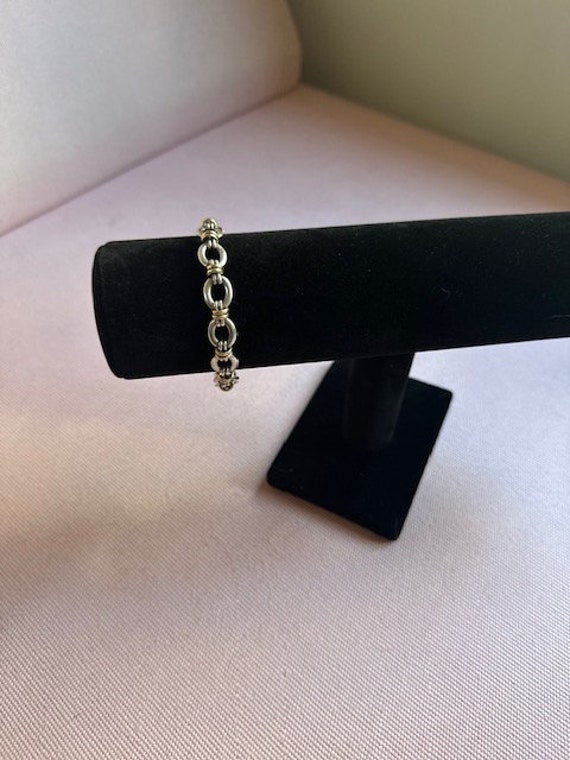 Silver bracelet with 14k yellow gold links