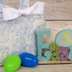 Easter Egg Hunt Candy Bag Basket Bucket Tote - Rabbits Bunnies Bunny Rabbit Fable in Blue Fabric - Personalized Name Tag Applique Available