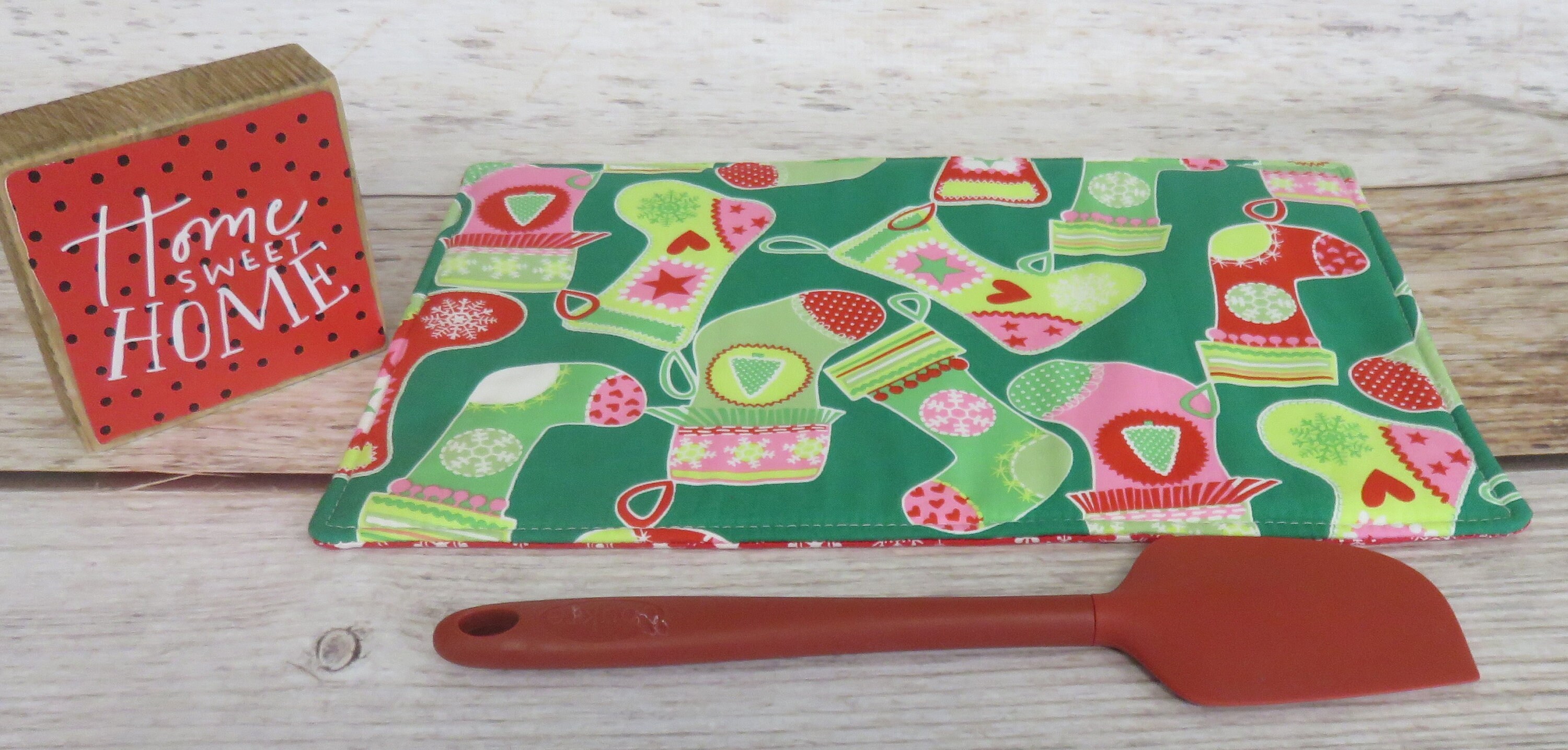Christmas Holiday Fun Stockings on Green Fabric | Hot Pad | Casserole Trivet | Counter Pad | Reversible