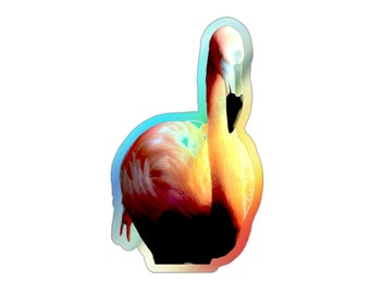 Peut inclure: Un flamant rose vibrant avec un bec jaune et des plumes orange et rouges. Le flamant rose se tient sur une seule patte et sa tête est inclinée sur le côté.