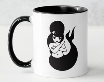 Salty Dame mermaid Coffee Mug with black handle and black interior.