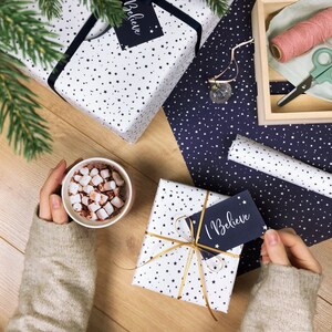 Set di carta da regalo riciclabile bianca con stelle di Natale "I Believe".