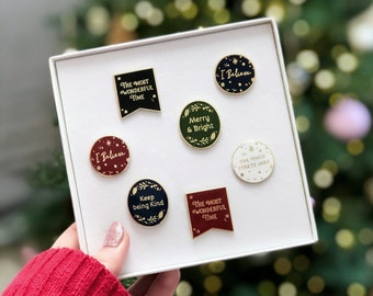 A Box Of Christmas Enamel Pin Badges - Christmas Eve Box Ideas