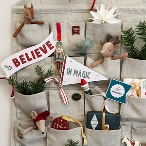A fabric advent calendar full of Clara and Macy gifts.