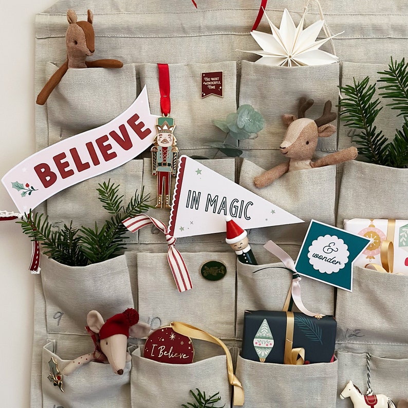 A fabric advent calendar full of Clara and Macy gifts.