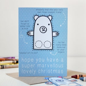 Tarjeta de Navidad con títeres de dedo de oso polar