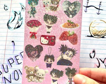 May include: A holographic sticker sheet featuring various anime-style illustrations. The sheet includes images of characters, bears, food, and hearts. The text "Choso Kamo <3" is at the top. The sticker sheet is held by a hand.