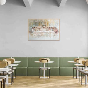 May include: A watercolor painting depicting the Last Supper, featuring Jesus and his disciples gathered around a table. The painting is framed and displayed on a wall in a modern interior setting.