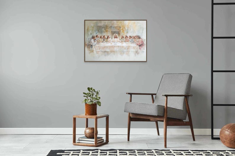 May include: A watercolor painting depicting the Last Supper, featuring Jesus and his disciples gathered around a table. The painting is framed in a simple wooden frame and hangs on a light gray wall.
