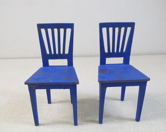 2 bookshelves as chairs in metal design Hans Edblad