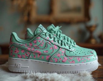 mint green and pink nike shoes