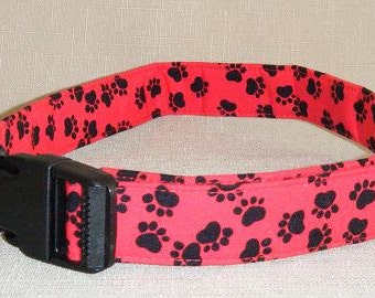 Black paw prints on red - Dog Collar