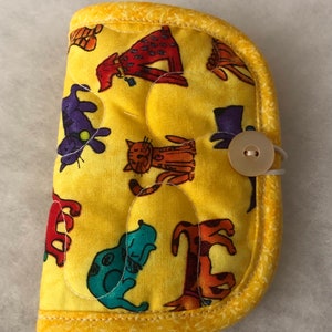 Quilted needle book organizer - dogs and cats on yellow