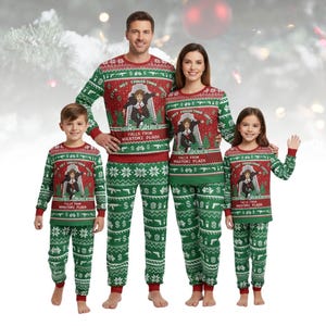 May include: Matching family Christmas pajamas in red and green. The long-sleeved tops feature a graphic of a man with text that reads "HANS GRÜBER FALLS FROM NIKATOMI PLAZA". The green pants have a pattern of guns and dollar signs.