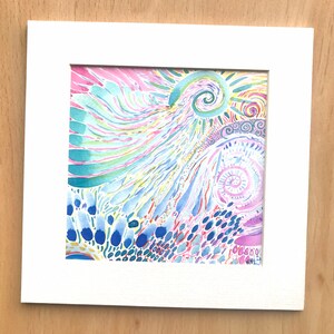 May include: A framed abstract watercolor painting with a swirling pattern in shades of blue, green, pink, and yellow.