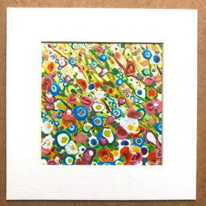 May include: Abstract painting with a colorful, swirling pattern of blue, green, yellow, red, orange, white, and pink. The painting has a textured, organic feel.