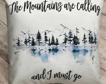 The Mountains are calling and I must go watercolor art on soft white throw pillow