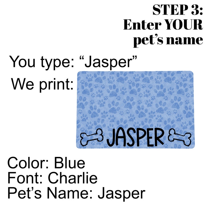 May include: A blue dog bed with paw prints and the name "Jasper" printed on it. The bed is personalized with the name "Jasper" in a black font. The text "Color: Blue, Font: Charlie, Pet's Name: Jasper" is also visible.