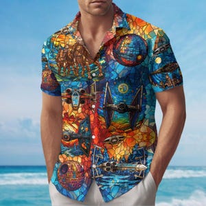May include: A short-sleeved button-up shirt with a colourful stained glass pattern featuring Star Wars characters and spaceships. The shirt has a blue, red, yellow, and green colour scheme.