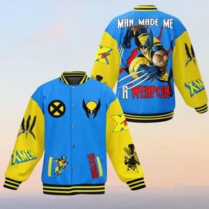 May include: A blue and yellow baseball jacket with a comic book character design. The jacket features the words "Man Made Me A Weapon" and the X-Men logo. The character is Wolverine.