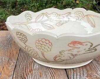 floral serving bowl with a bunny illustrated story pottery