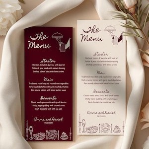 Puede incluir: Dos tarjetas de menú rectangulares con el texto The Menu, Starter, Main, Desserts y Emma and Daniel 06.21.20XX. Una tarjeta es de color burdeos oscuro con texto y dibujos lineales blancos, la otra es crema con texto y dibujos burdeos.