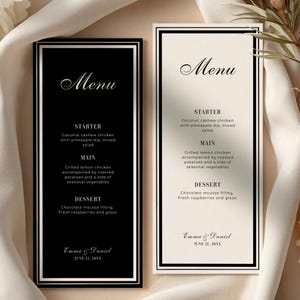 May include: Two rectangular menu cards featuring a black and white color scheme with a double-line border. The text reads Menu, Starter, Main, Dessert, and Emma & Daniel June 21, 20XX. One card has a black background with white text, the other is white with black text.