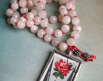 Hand-Knotted Beaded Necklace Featuring A Sterling Silver Pendant With A Vintage 1962 Magyar Floral Stamp .925