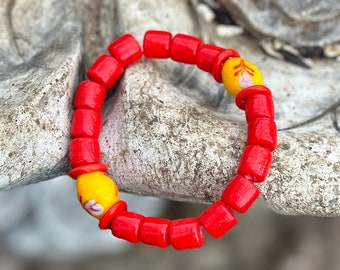 Colorful Tribal Beaded Stretch Bracelet in Reds and Yellows featuring a Floral Motif Beads