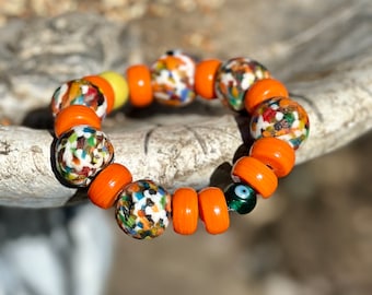 Vintage Sandcast Beaded Handcrafted OOAK Bracelet has Substantial Weight and Bold of Colors with Glass Evil Eye Bead