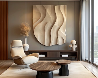 May include: A modern living room featuring a beige armchair, two wooden coffee tables, and a beige wall sculpture. The room has a large window with beige curtains and a wooden floor.