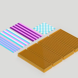 May include: A set of four colorful patterned mats, including a blue and pink striped mat, a purple and white striped mat, a white and blue checkered mat, and a gold mat with vertical lines.