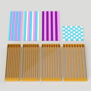 May include: Four gold cookie cutters with a vertical line pattern and one cookie cutter with a checkered pattern. The cookie cutters are arranged in a row on a white surface. The cookie cutters are for making striped and checkered cookies.