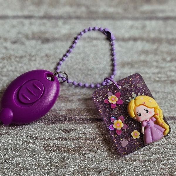 Tower Princess Charm Bundle, including resin charm, necklace, mini flashlight, and keychain