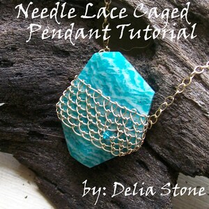 May include: A turquoise and white stone pendant with a gold wire cage. The pendant is hanging from a gold chain. The text "Needle Lace Caged Pendant Tutorial by: Delia Stone" is visible in the image.