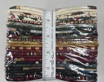 May include: A stack of 18 fabric squares in various Christmas-themed prints, including red, green, and gold. The fabric is wrapped in clear plastic and secured with a white measuring tape labeled "moda fabrics - supplies - www.modafabrics.com".